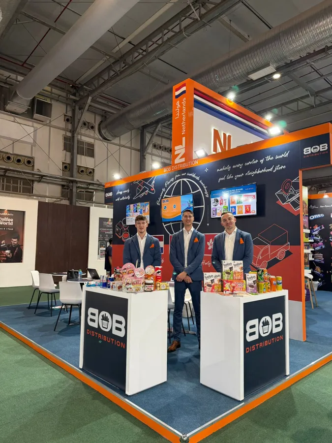 BOB Distribution's stand at the Saudi Food Show: two white counters with the BOB logo and three staff members in front.
